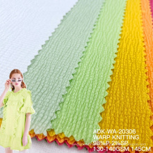 Free sample Hot Sale Customized tricot polyester warp knitting seersuker cheap europe textiles varley fabric for garment